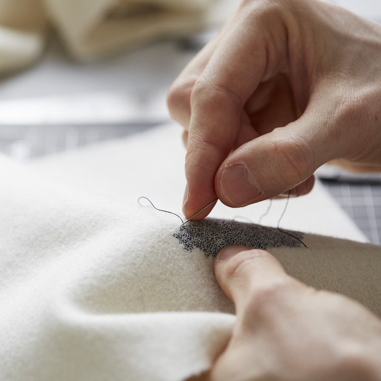 Richard McVetis Hand and very small black embroidery technique